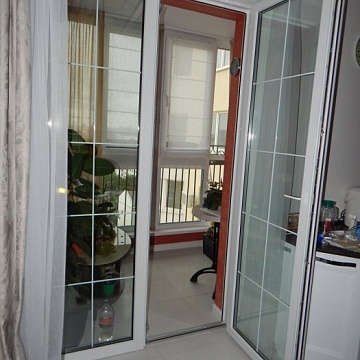 Алюминиевые балконные двери